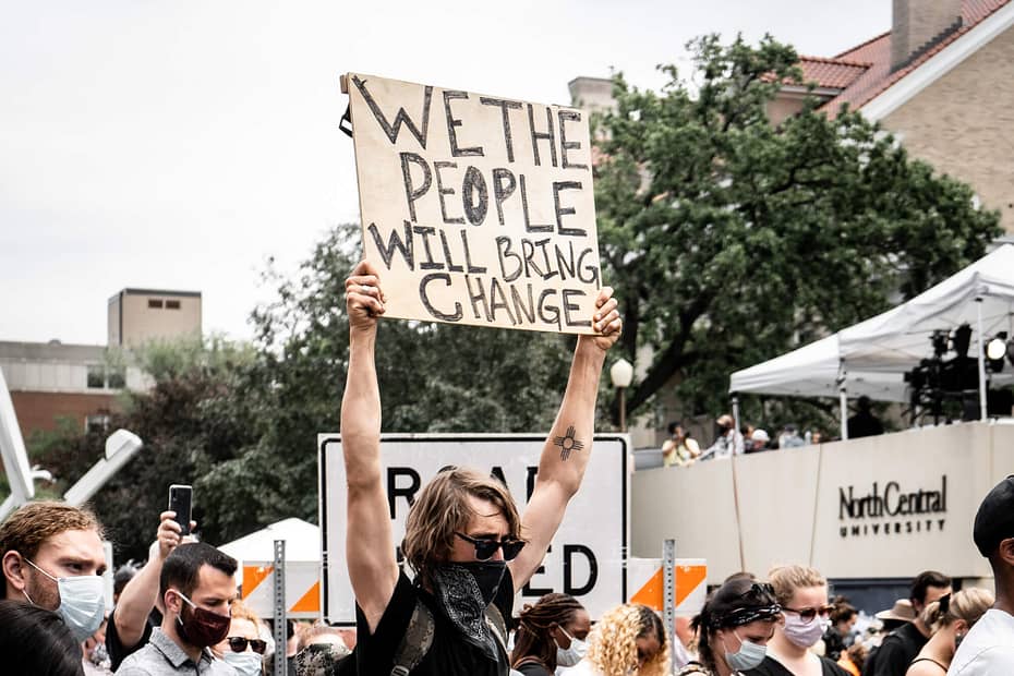 We the people will bring change. Black Lives Matter protestor seeking unity during a divided time. Photo taken at George Floyd Family Memorial Service. Black Lives Matter. Photo by munshots on Unsplash.